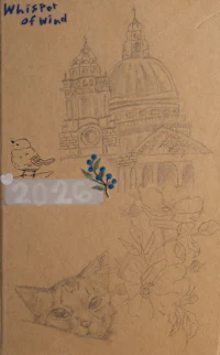 a notebook with drawings of a cat and a building